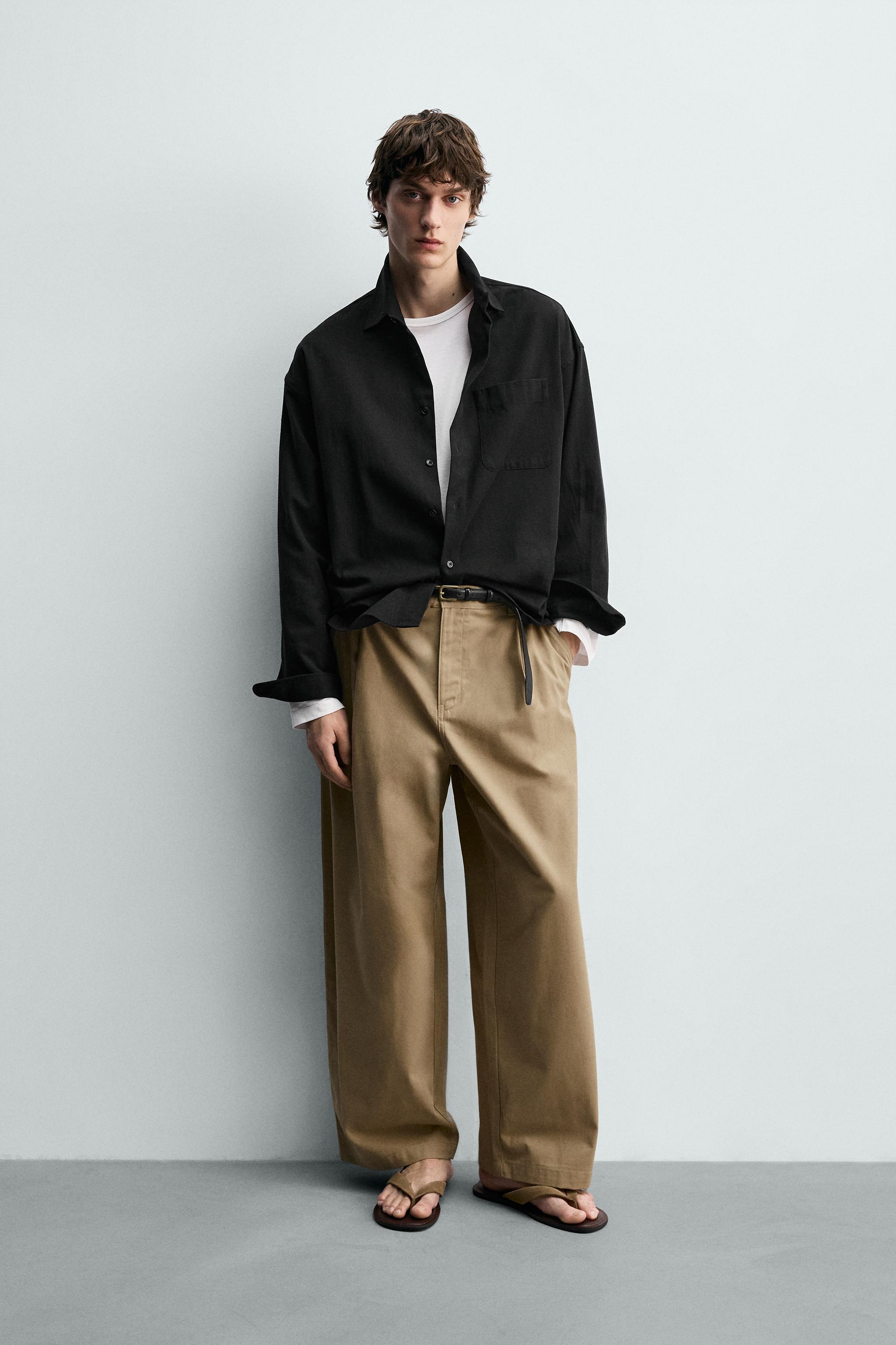 PANTALON COUPE LARGE À PLIS